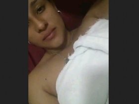 Arousing Punjabi beauty stimulates her moistened womanhood to climax