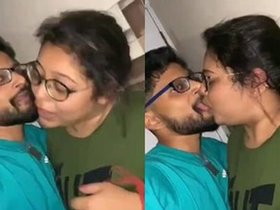 A curvy girl from Bengal engages in passionate kissing
