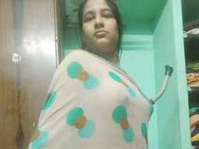 Indian village girl reveals her attractive breasts