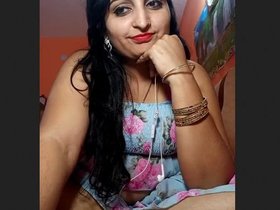 Arousing wife displays her breasts