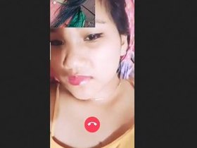 An Assamese teenager reveals her breasts