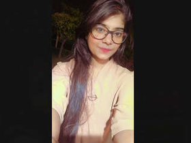 An attractive Indian woman reveals her breasts during a video chat