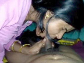 Indian aunty gives a blowjob in the middle of the night