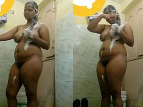Telugu woman unreservedly displays her bare physique while bathing