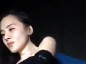 Attractive Asian girl showing her pussy and then some