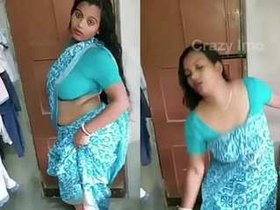 Sultry South Asian auntie performs dance routine