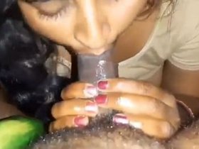 Aroused Indian wife gives oral pleasure to a black man's penis