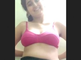 A sultry wife engages in intimate activities with her partner