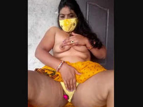 Indian housewife Geeta displays her body on the upper terrace