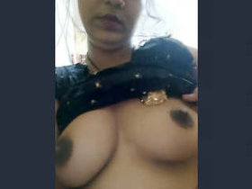 Seductive wife reveals her breasts