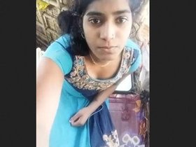 A rural girl's nude performance captured on camera