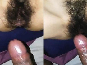 A girl's bushy pussy gets drilled