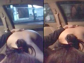 An audacious Indian wife strips naked and performs oral sex on her husband while riding in a car