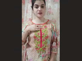 Arousing young woman undresses for her boyfriend