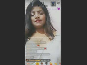 Shruti's sensual tango performance with voluptuous breasts