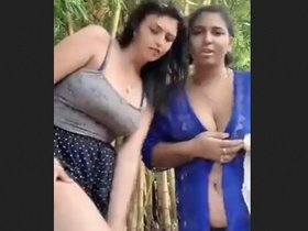 Two gorgeous women show off their large breasts and curvy backsides for your enjoyment