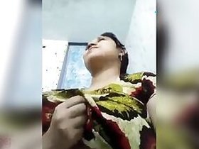 Desi fatty poses for the camera to show off her big xxx tits and pussy
