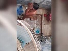 Secretly watching that beautiful Aunt Desi bathing naked outdoors and singing, Mms video