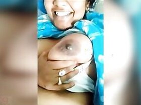 Desi's milk boobs exposed in close-up in a homemade video