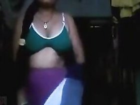 Desi Abode's wife undresses and jerks her tight vagina with her finger in front of the camera