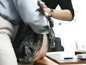 Hidden camera catches an elderly slut enjoying office sex