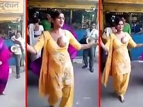 Stunning Indian aunt XXX dancing striptease with one of her boobs out
