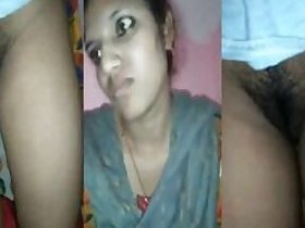 Shy Desi Tini pulls up her dress to show off her XXX pussy in the bathroom