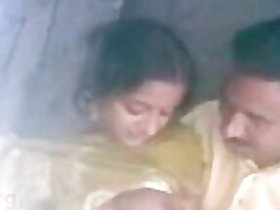 A South Indian sex film scene of a desi warmer fooling around with her lover