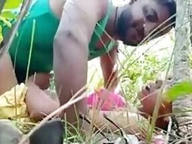 Young amateur couple lovers enjoy outdoor sexual activities in a rice paddy