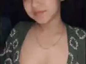 Sexy girl with huge tits shows
