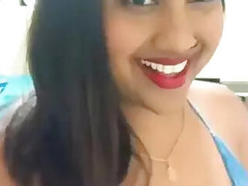 Desi girl with huge boobs in a blue suit