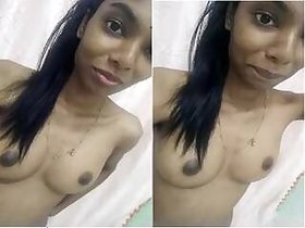 Cute Lankan Tamil girl shows her tits and pussy