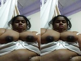 A horny NRI Bhabhi Plays with her tits on camera